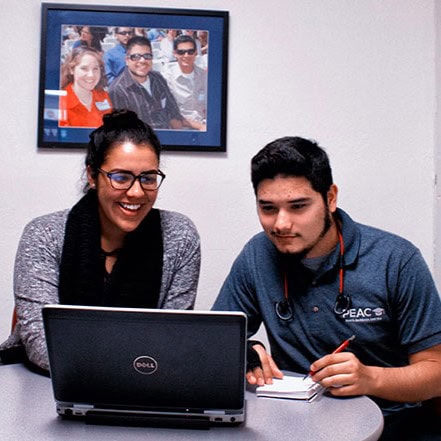 Program advisor working with student.